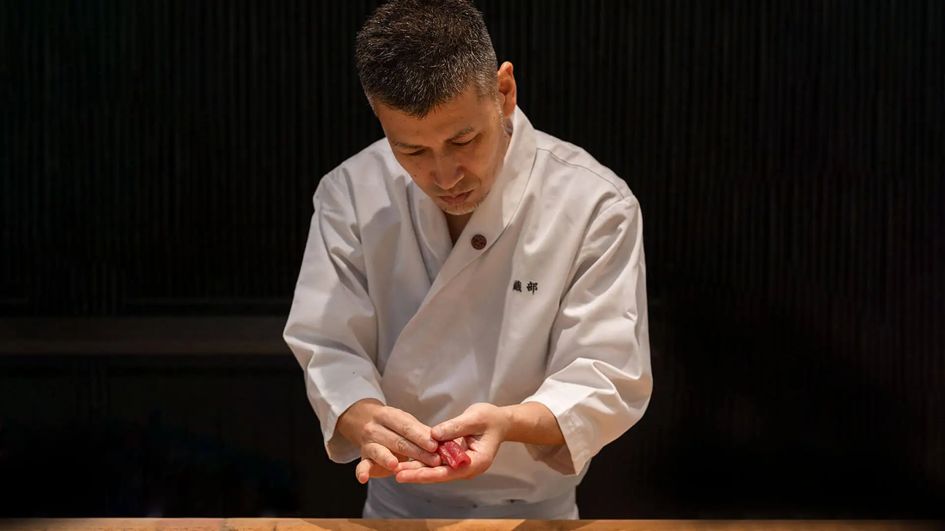Chef Naoya Kawasaki preparing Edomae omakase at the counter at Sushi Oribe in Kuala Lumpur