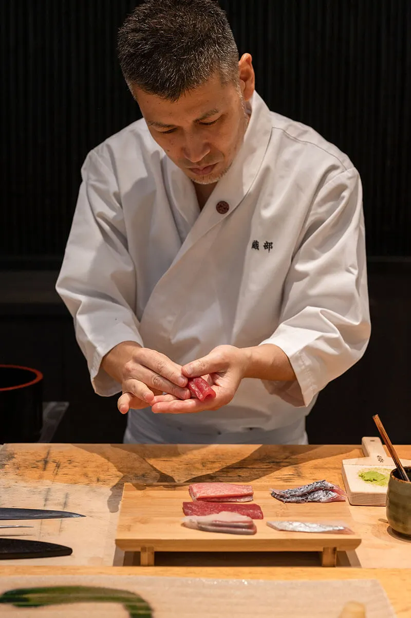 Chef Naoya Kawasaki preparing Edomae omakase at the counter at Sushi Oribe in Kuala Lumpur